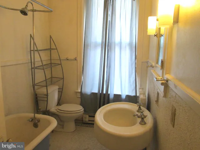 a bathroom with a sink and a tub