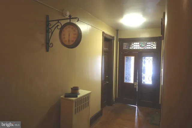 a bathroom with a sink vanity and a mirror