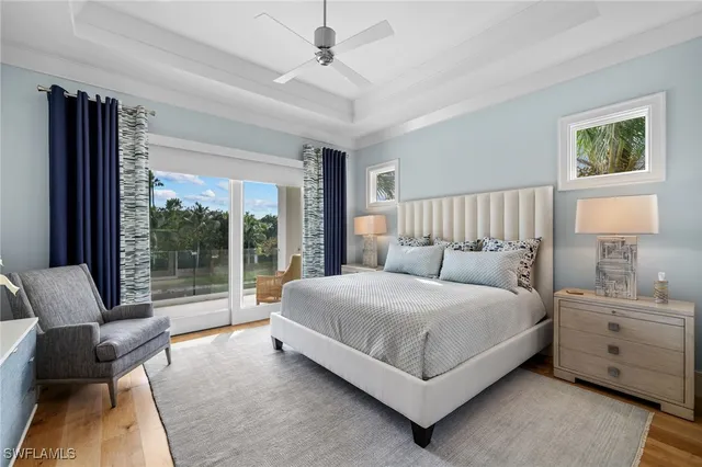 a bathroom with a double vanity sink a mirror and a shower