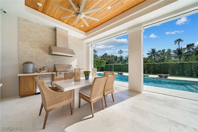 a outdoor space with a couch and chairs