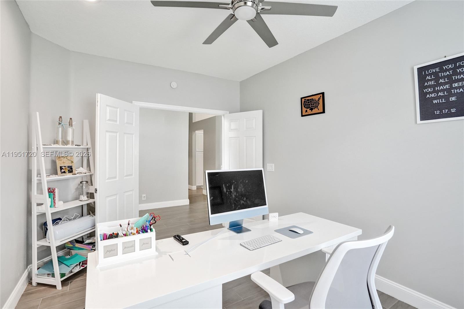 8795 Northwest 76th Place Tamarac, FL 33321 - Photo 25 of 69 a view of a dining room with furniture