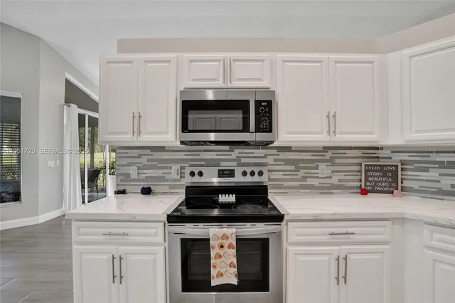 $650,000 | 8795 Northwest 76th Place, Tamarac, FL 33321