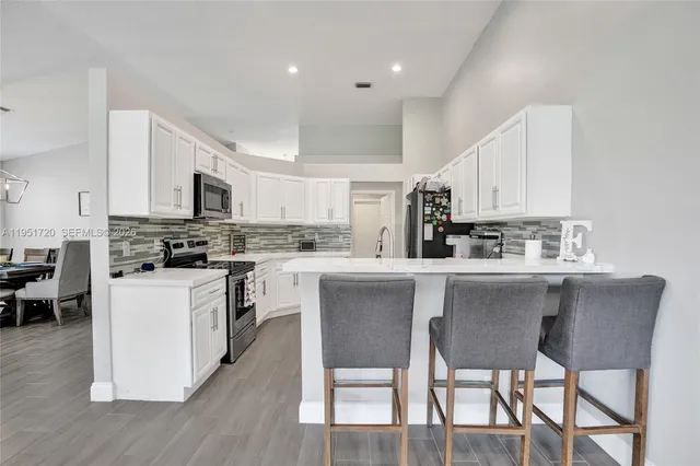 a view of a dining room with furniture