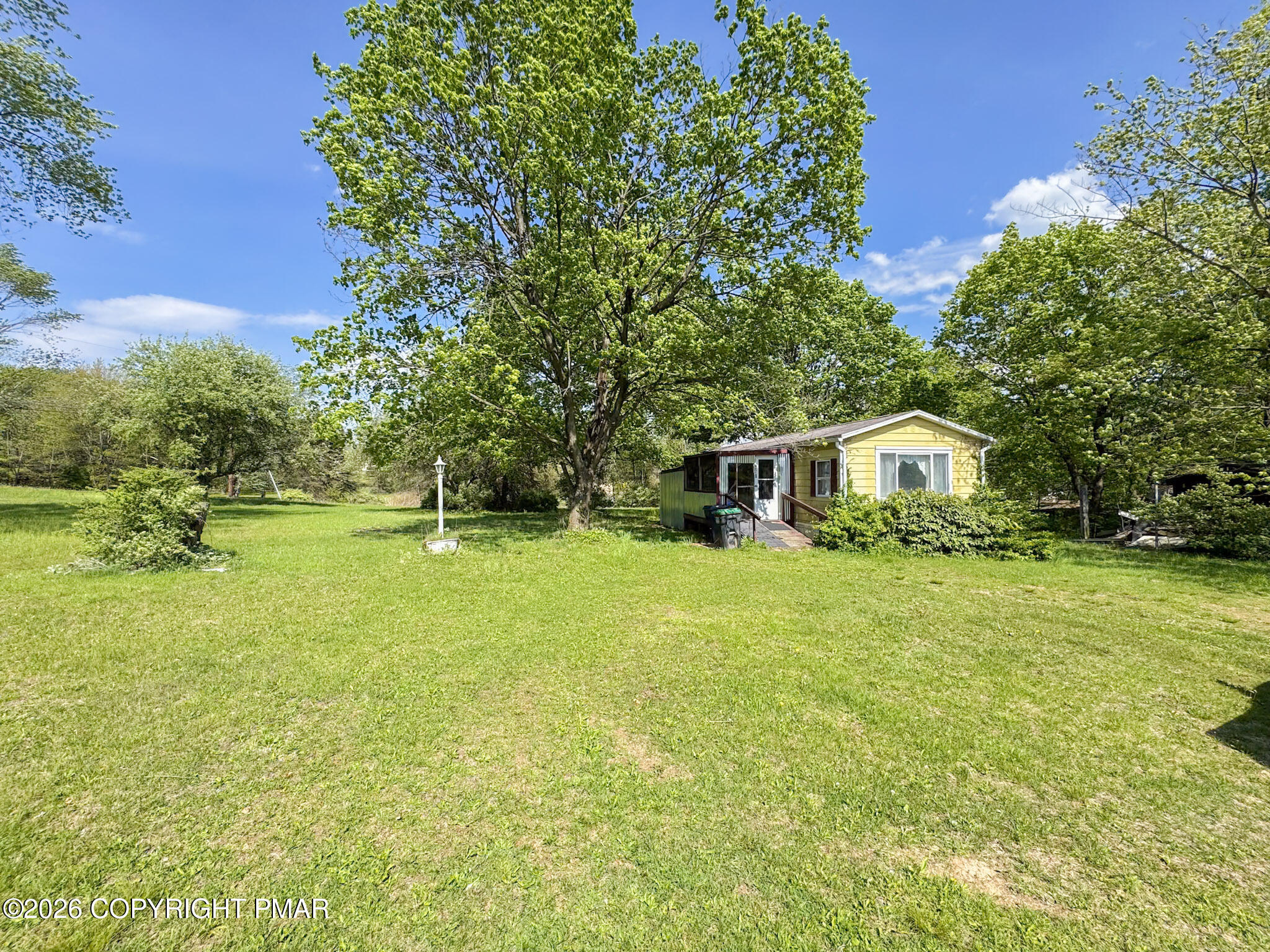 279 East Lizard Creek Road Lehighton, PA 18235 - Photo 1 of 25 a front view of a house with a yard