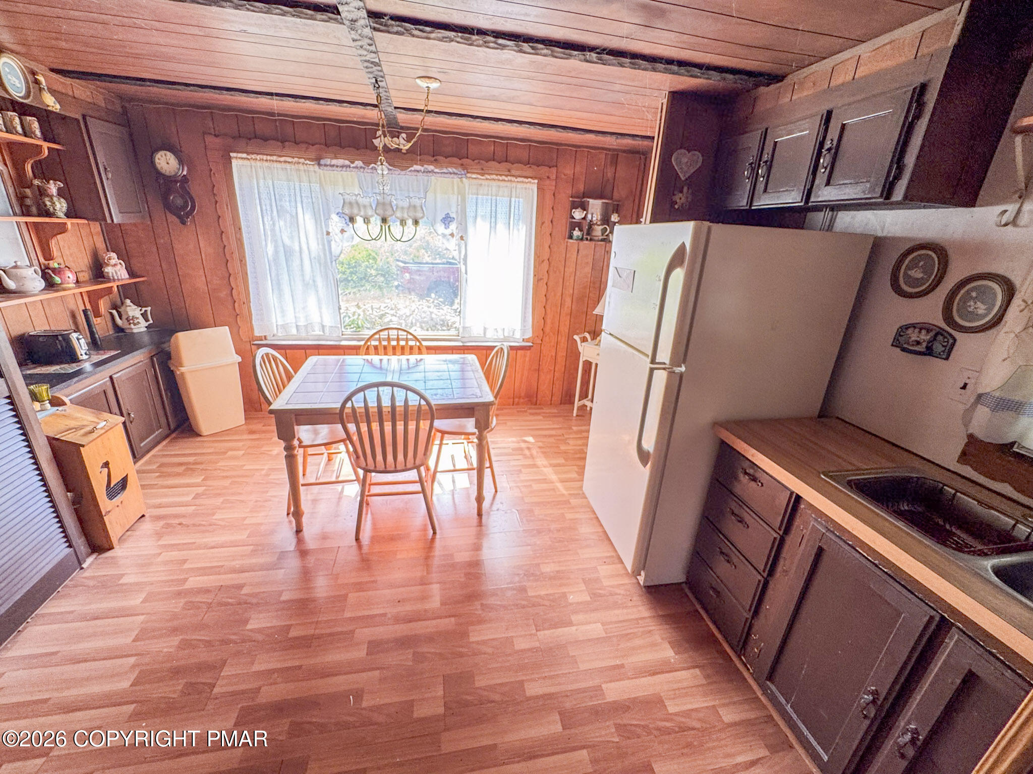 279 East Lizard Creek Road Lehighton, PA 18235 - Photo 5 of 25 a view of a dining room with furniture window and wooden floor