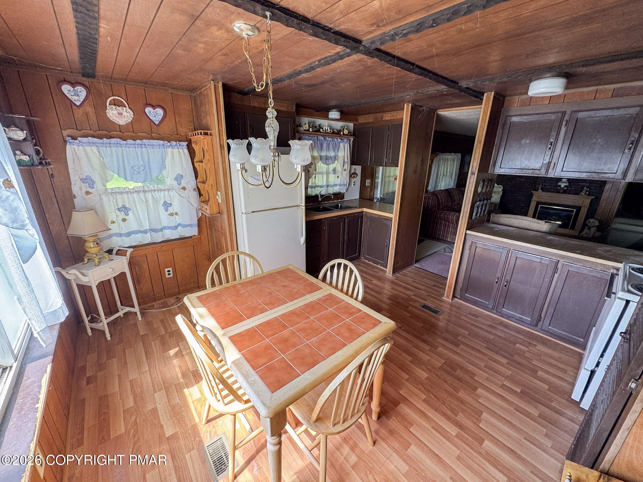 279 East Lizard Creek Road Lehighton, PA 18235 - Photo 6 of 25 a view of a dining room with furniture and wooden floor