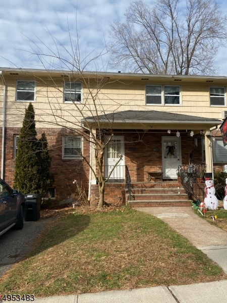 a view of a house with a porch