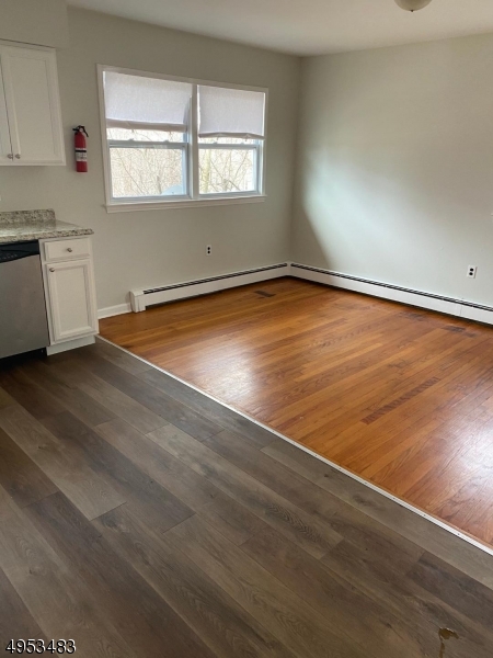 1 Kings Road Netcong, NJ 07857 - Photo 3 of 8 an empty room with wooden floor and windows