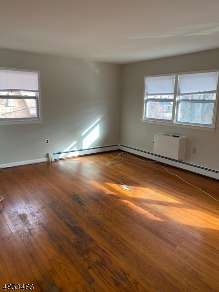 1 Kings Road Netcong, NJ 07857 - Photo 7 of 8 wooden floor in an empty room with a window