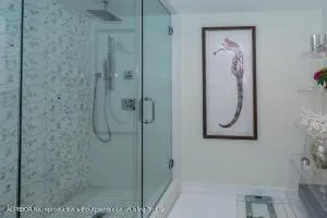 a view of a swimming pool with a yard