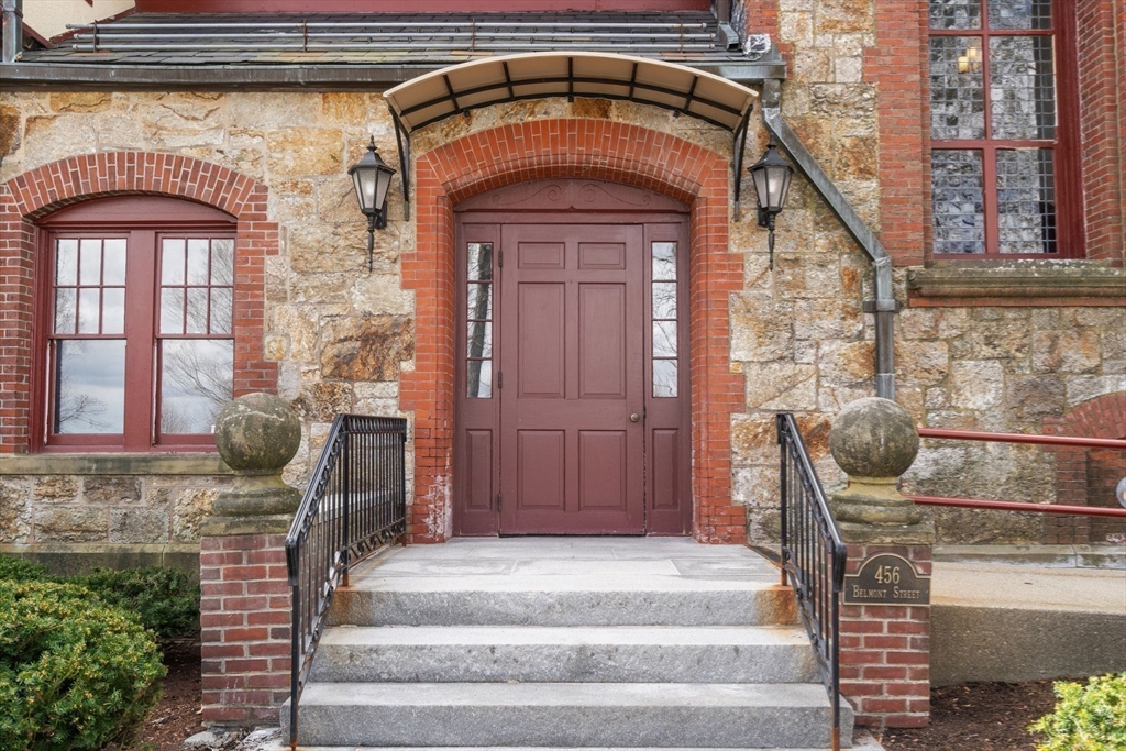 456 Belmont Street, Unit 21 Watertown, MA 02472 - Photo 14 of 19 a front view of a house with entryway