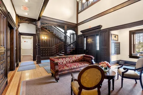 a view of a swimming pool and a yard