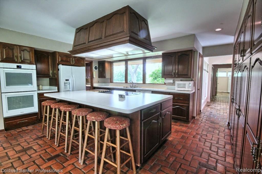 9777 Warren Road Plymouth, MI 48170 - Photo 10 of 32 Kitchen with large island