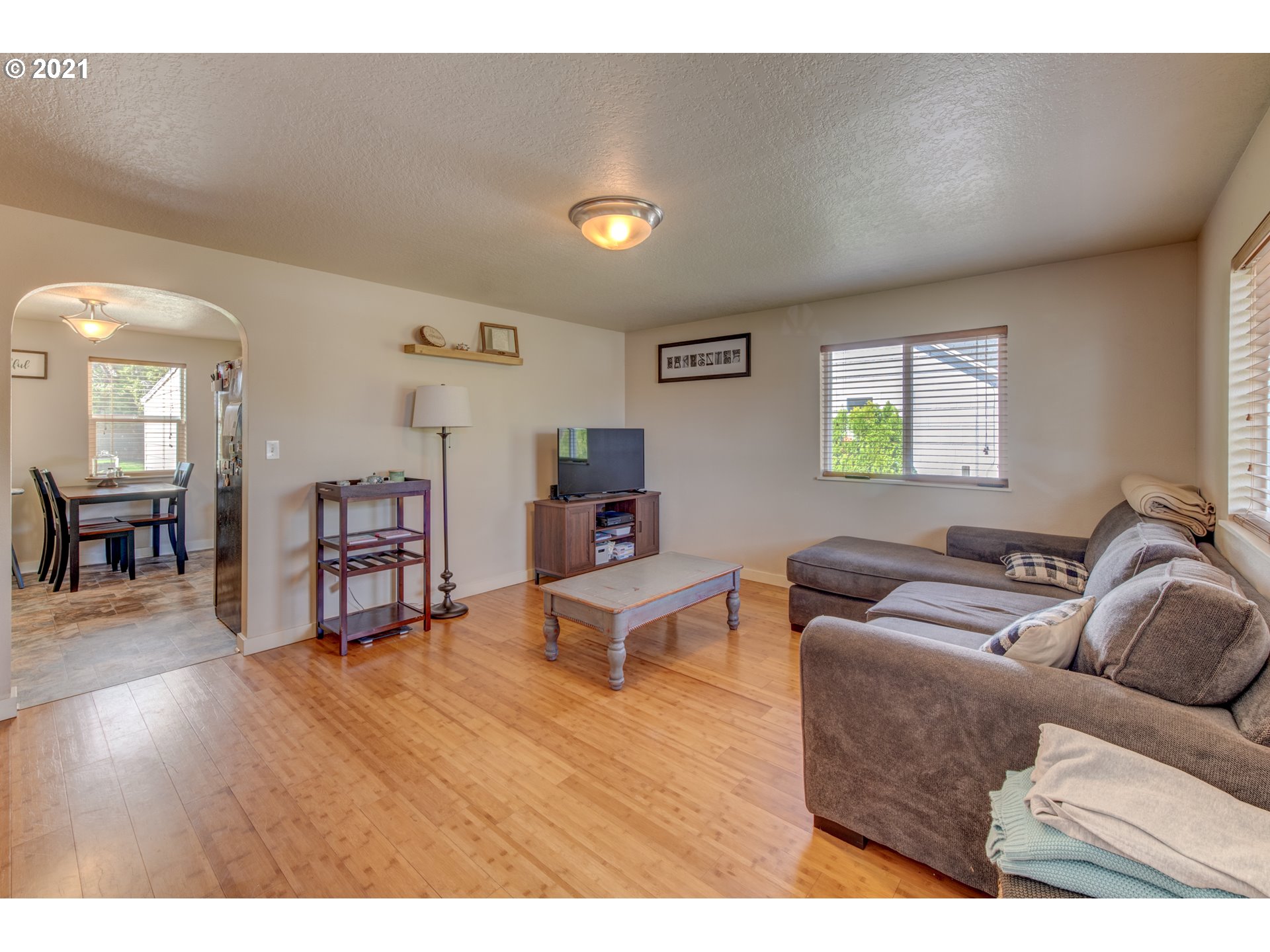 468 17th Street Springfield, OR 97477 - Photo 4 of 21 a living room with furniture and a wooden floor