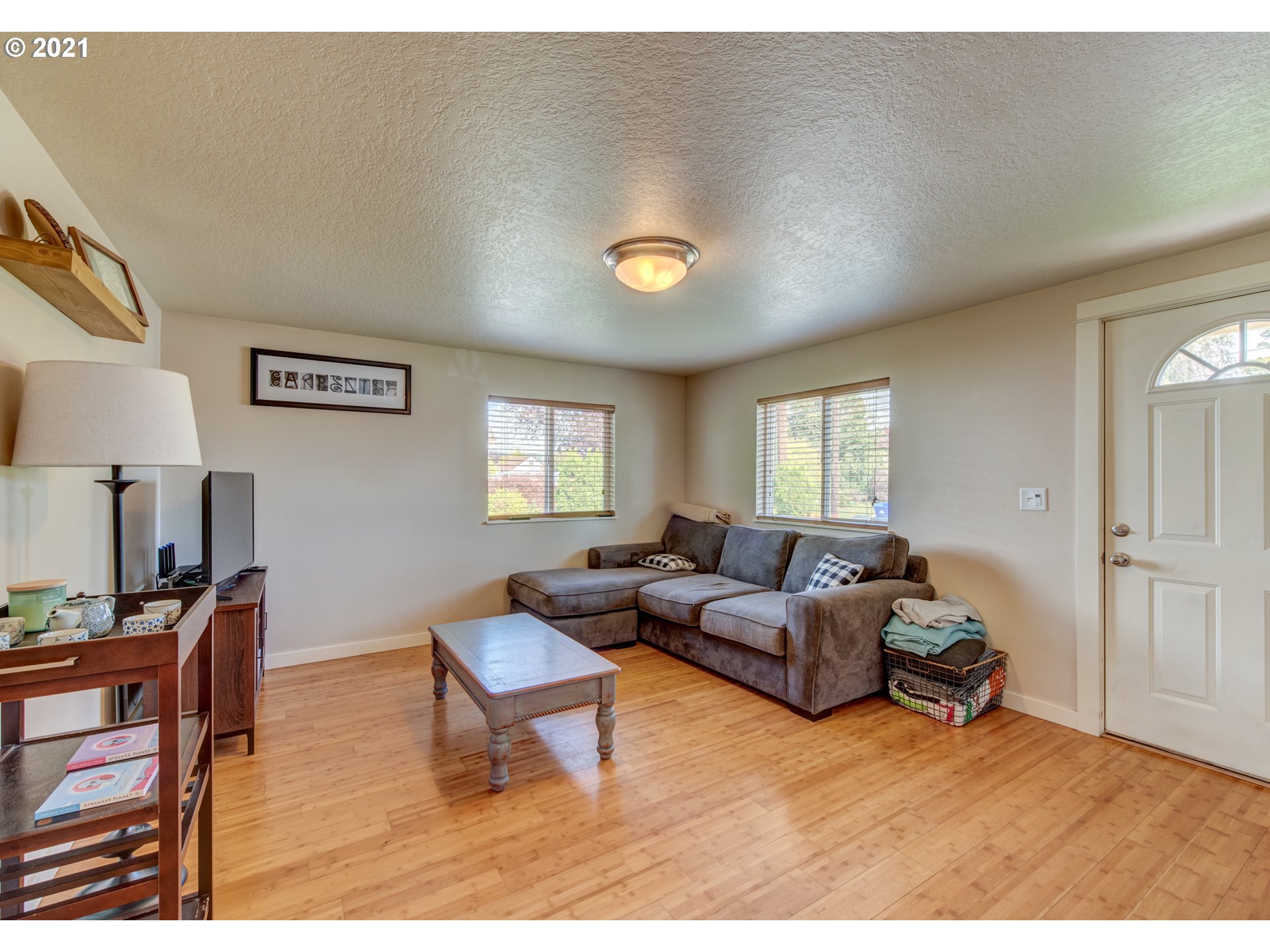 468 17th Street Springfield, OR 97477 - Photo 5 of 21 a living room with furniture and a window