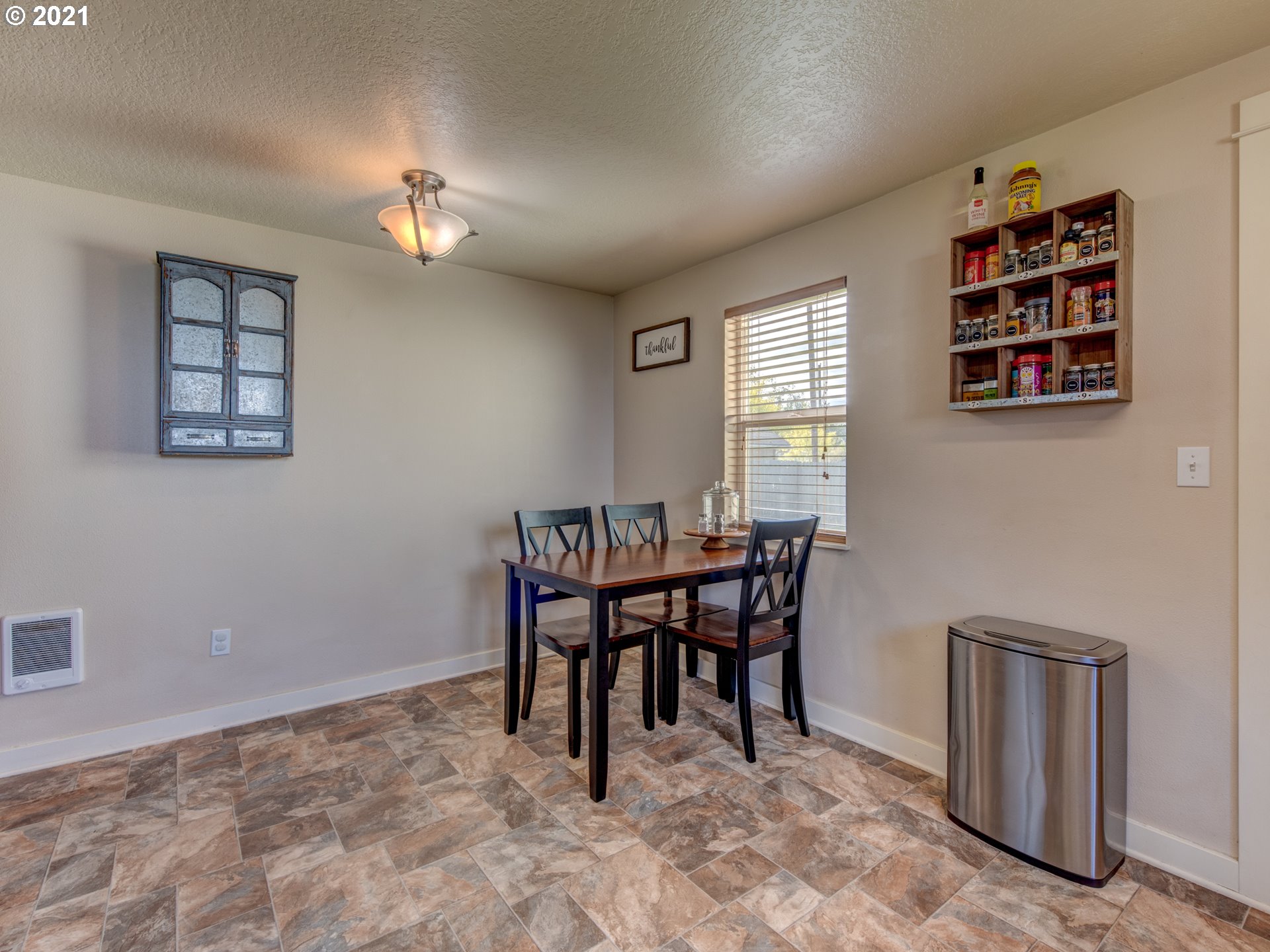 468 17th Street Springfield, OR 97477 - Photo 9 of 21 a view of a dining room with furniture