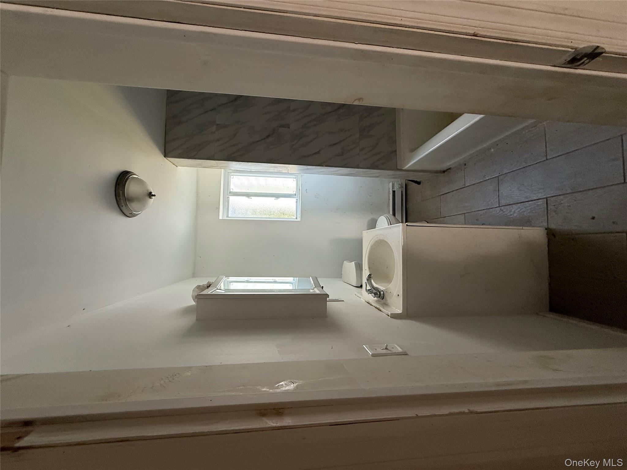 5 Plank Road Mongaup Valley, NY 12762 - Photo 20 of 30 a bathroom with a sink toilet and tub