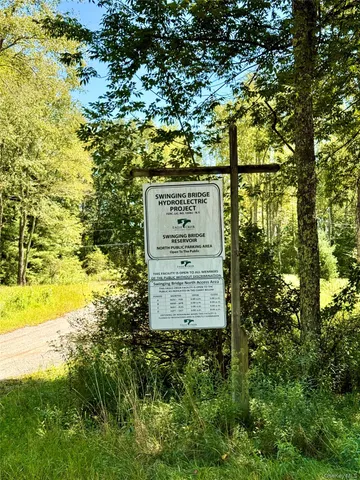 a view of water from a yard