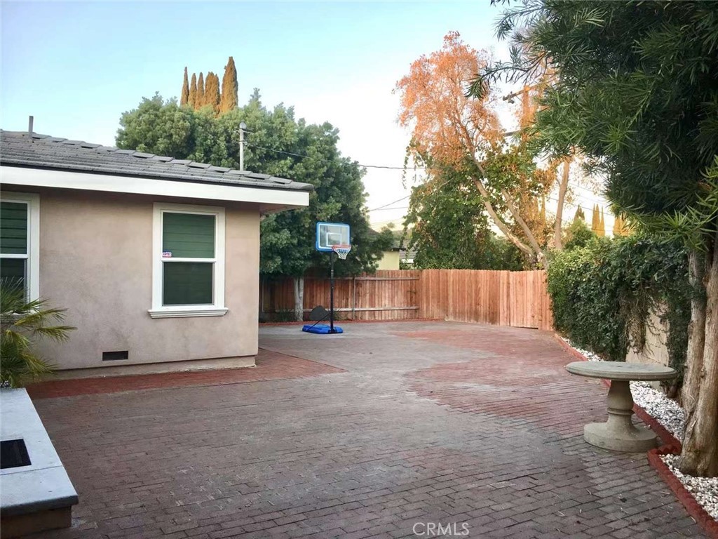 412 Magellan Road Arcadia, CA 91007 - Photo 15 of 15 a house with trees in the background
