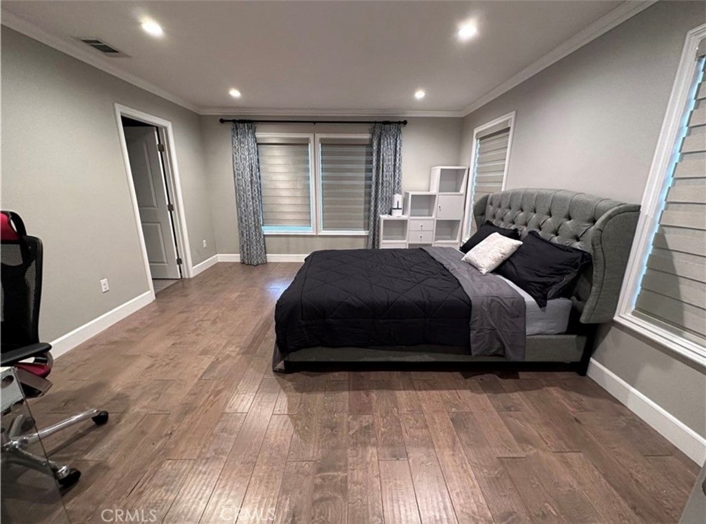 412 Magellan Road Arcadia, CA 91007 - Photo 7 of 15 a spacious bedroom with a large bed and a flat tv screen