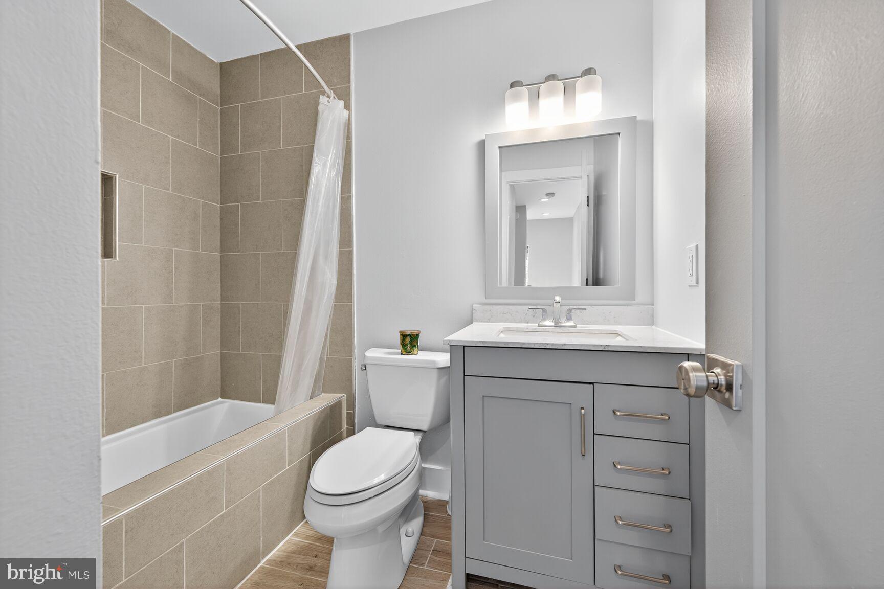 12 Tynewick Court Silver Spring, MD 20906 - Photo 23 of 35 Hallway Bathroom