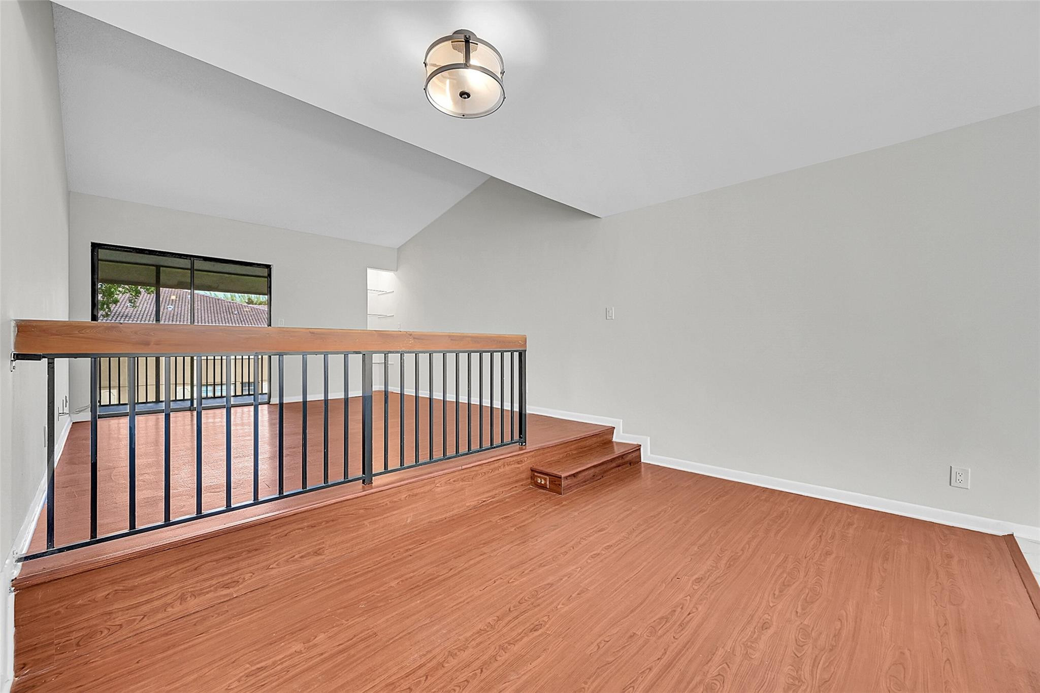 2578 Riverside Drive, Unit 421 Coral Springs, FL 33065 - Photo 11 of 29 a view of a room with wooden floor
