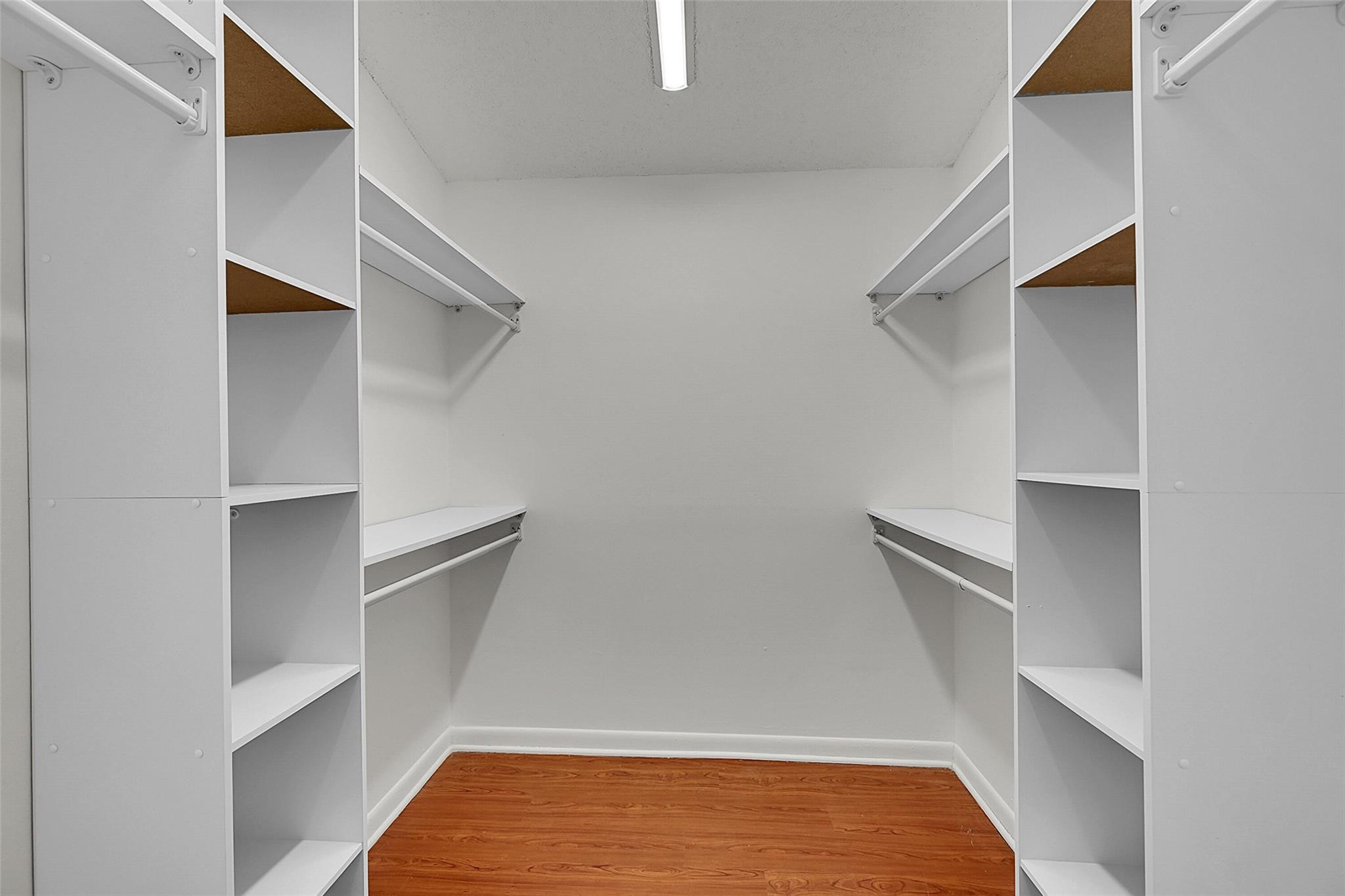 2578 Riverside Drive, Unit 421 Coral Springs, FL 33065 - Photo 14 of 29 a view of walk in closet with empty racks