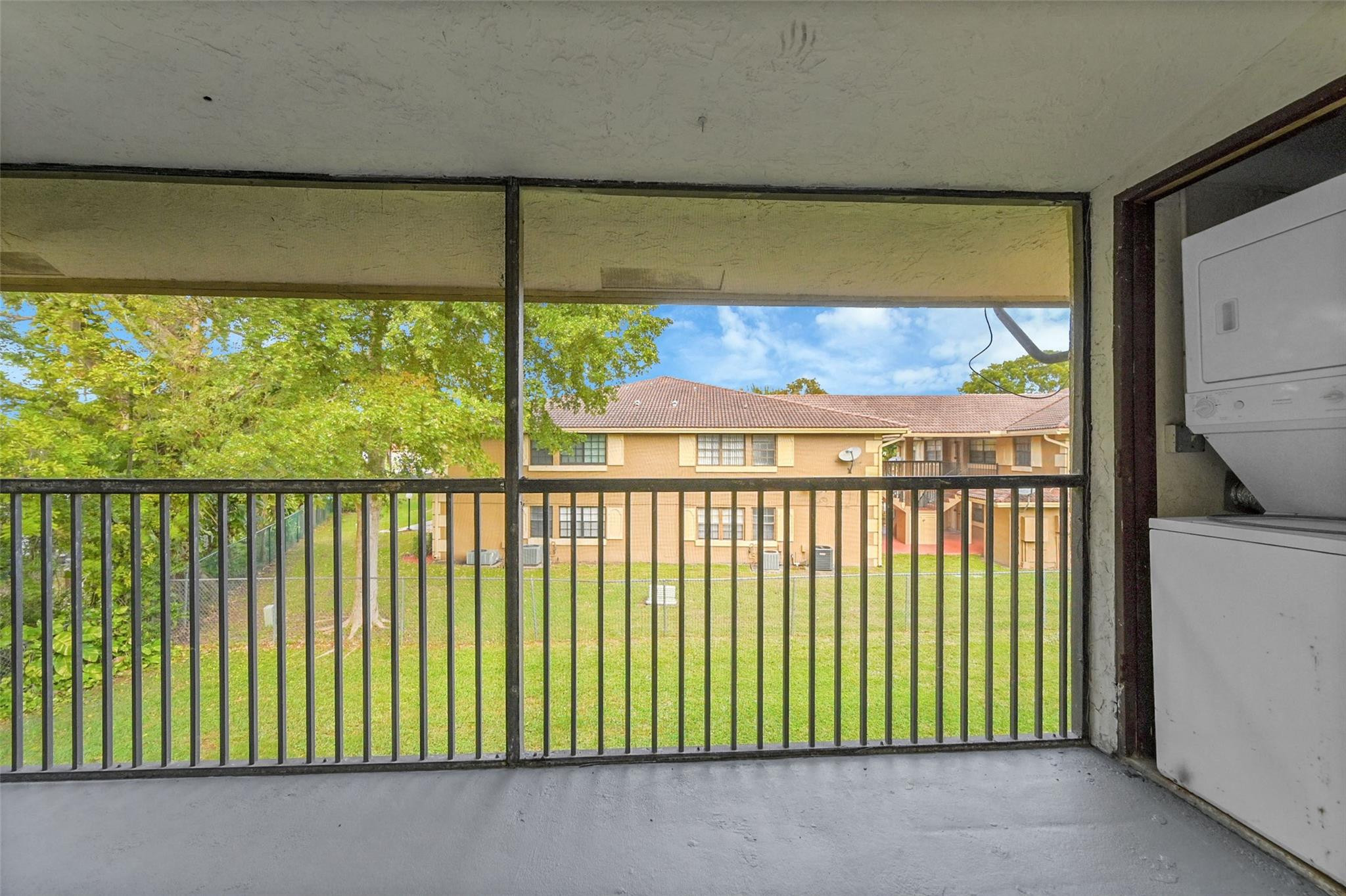 2578 Riverside Drive, Unit 421 Coral Springs, FL 33065 - Photo 22 of 29 a view of a balcony from a room