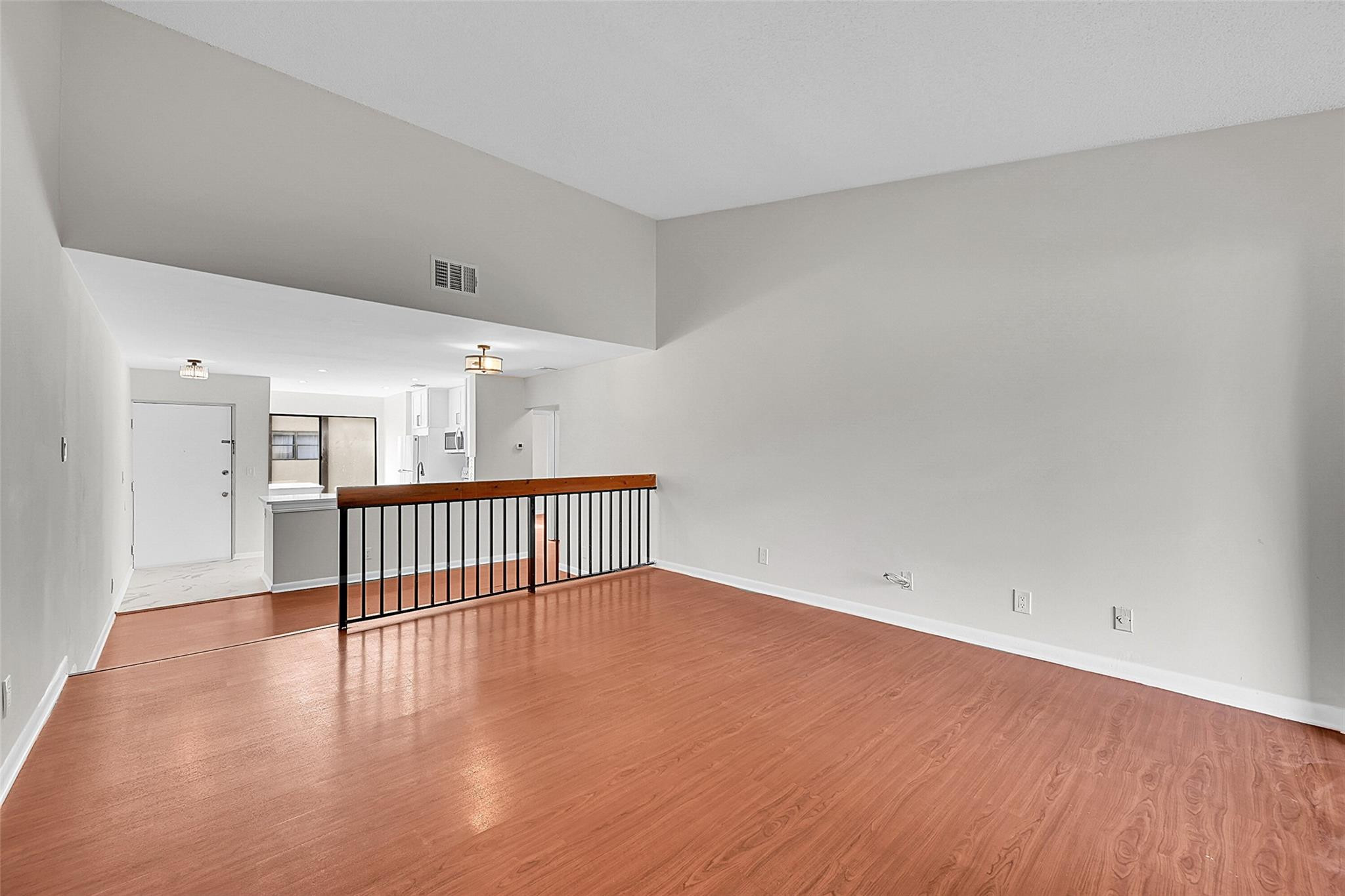 2578 Riverside Drive, Unit 421 Coral Springs, FL 33065 - Photo 10 of 29 a view of staircase with white walls