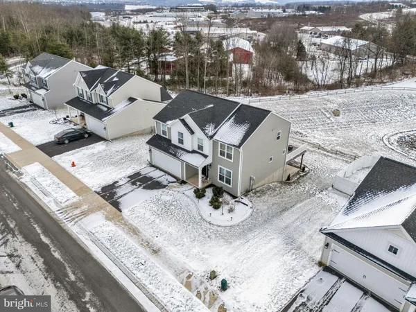 a bathroom with a sink toilet and mirror