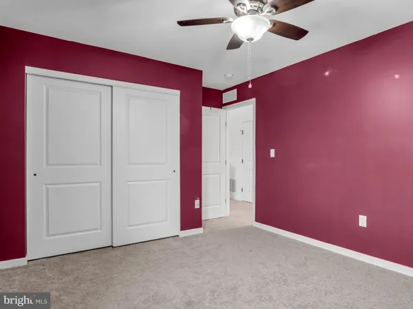 a room with furniture and gym equipment