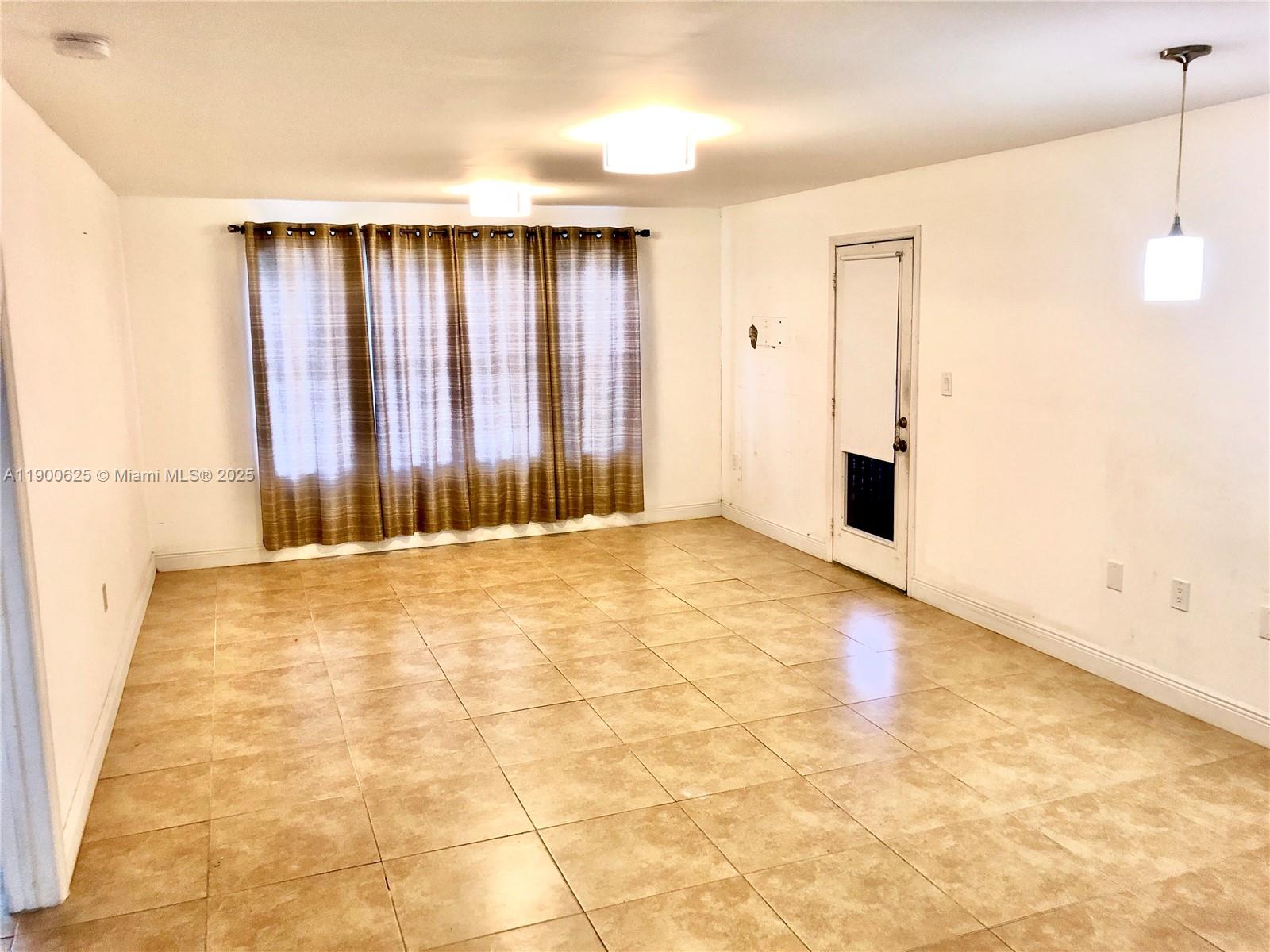 10440 Southwest 156th Court, Unit 712 Miami, FL 33196 - Photo 3 of 11 a view of a room with a natural light