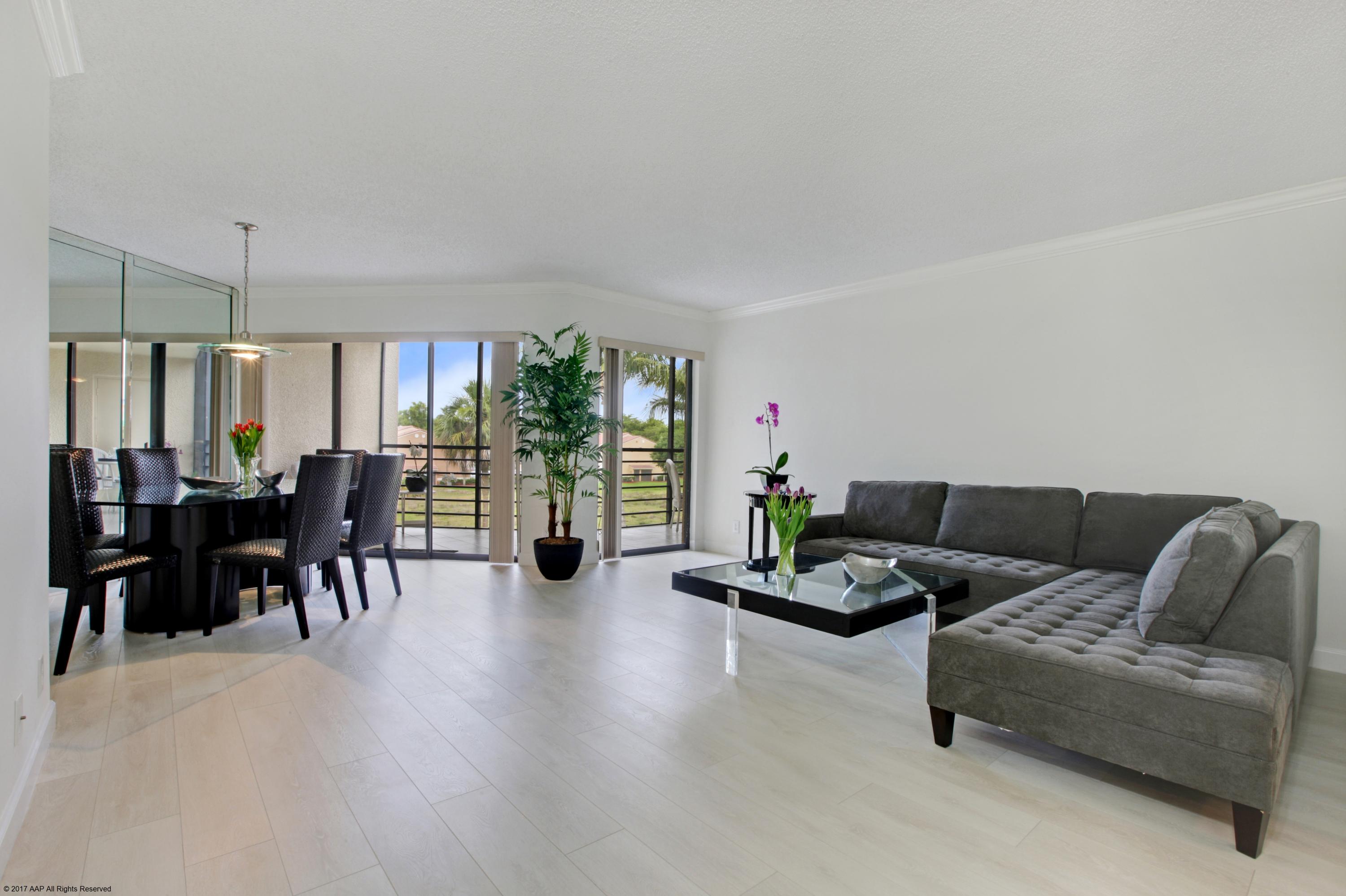 5801 Camino Del Sol, Unit 305 Boca Raton, FL 33433 - Photo 2 of 15 Living Room /Dining