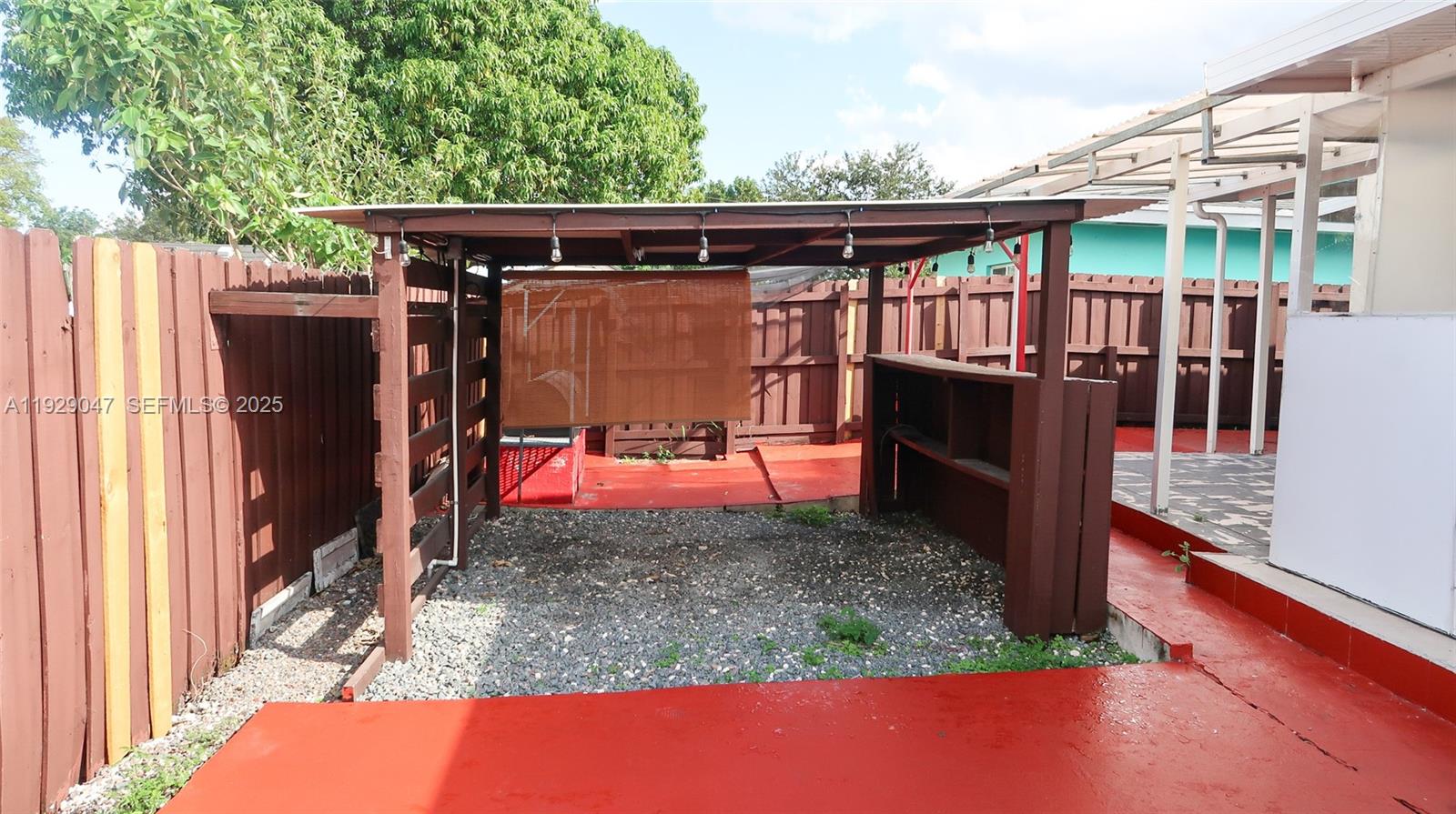 3109 Northwest 64th Street Miami, FL 33147 - Photo 22 of 38 a view of outdoor space and deck