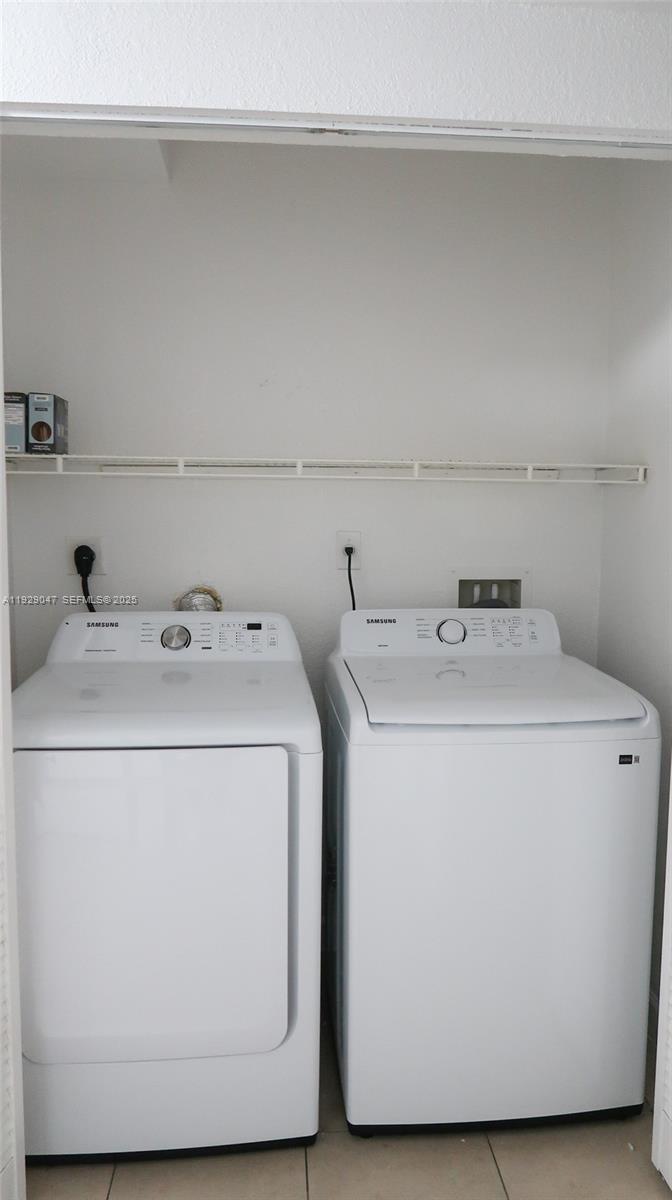 3109 Northwest 64th Street Miami, FL 33147 - Photo 35 of 38 a utility room with dryer and washer