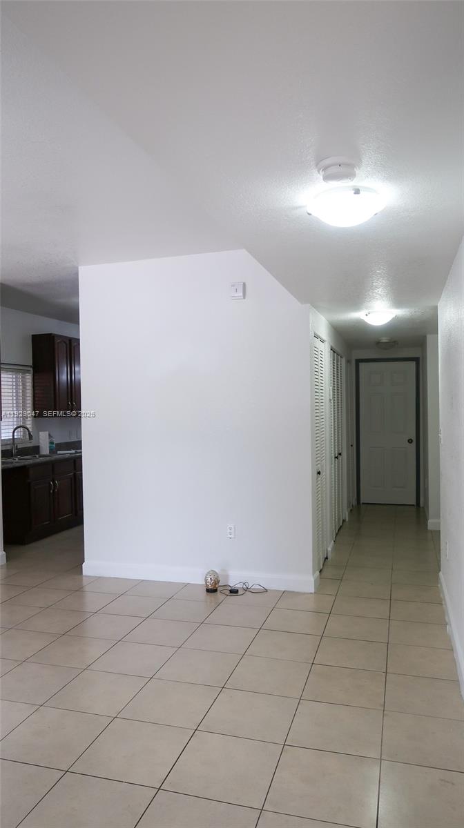 3109 Northwest 64th Street Miami, FL 33147 - Photo 9 of 38 a view of a livingroom with an empty space
