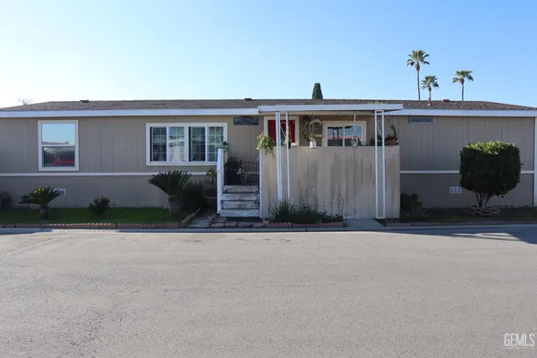 front view of a house with a street