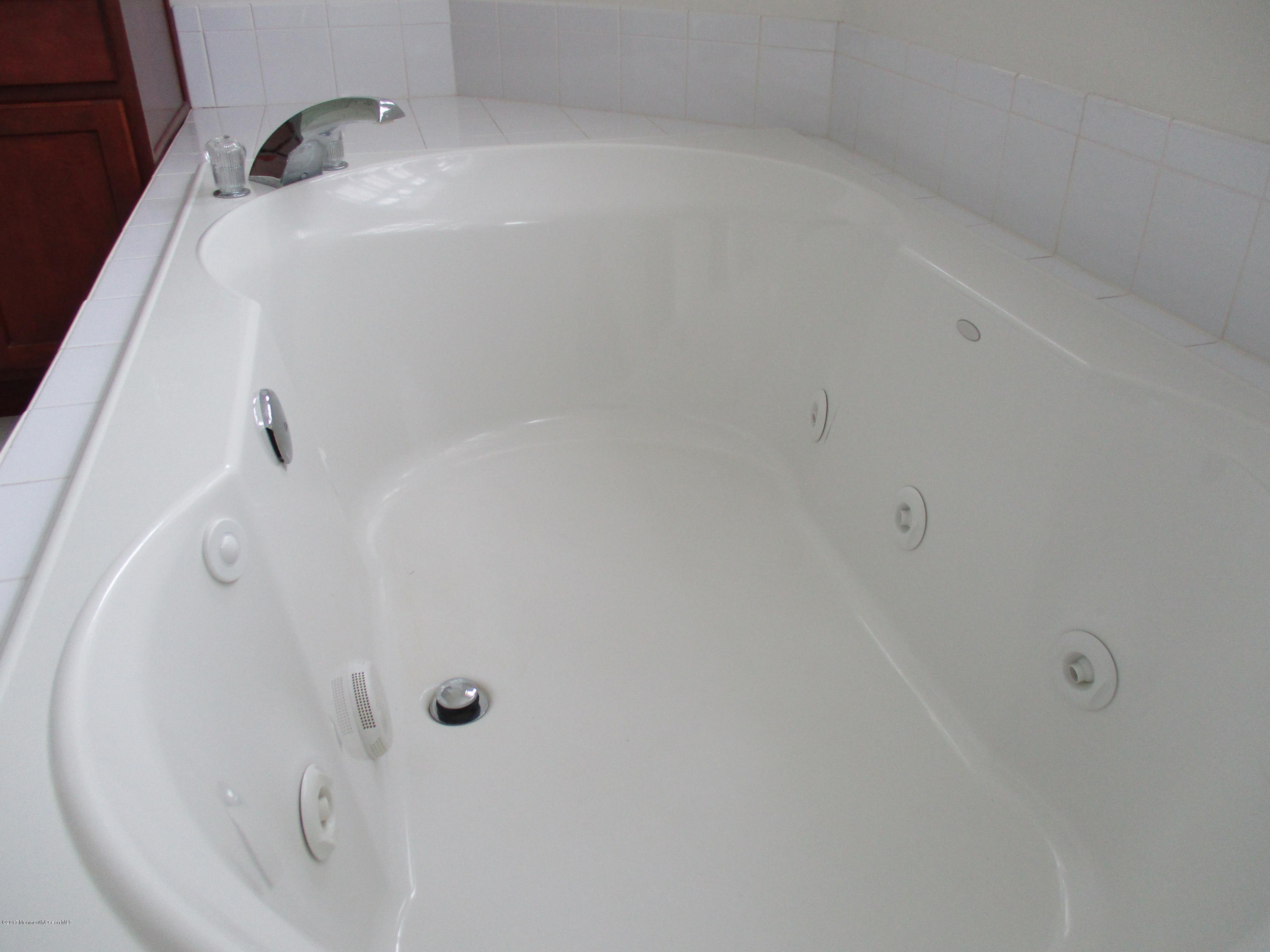 152 Barracuda Road Manahawkin, NJ 08050 - Photo 18 of 30 a bathroom with a shower