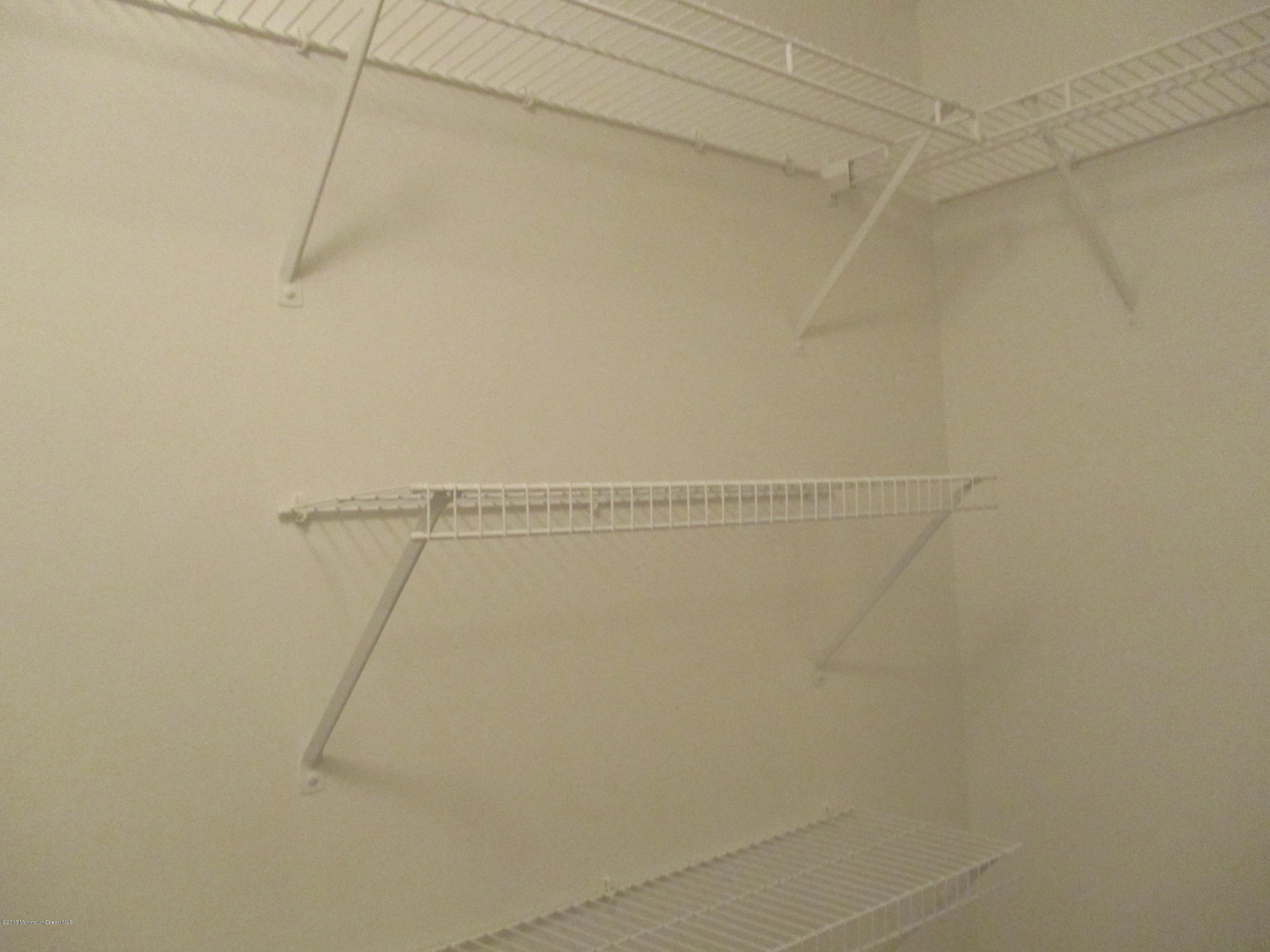 152 Barracuda Road Manahawkin, NJ 08050 - Photo 24 of 30 a view of a rack on the wall