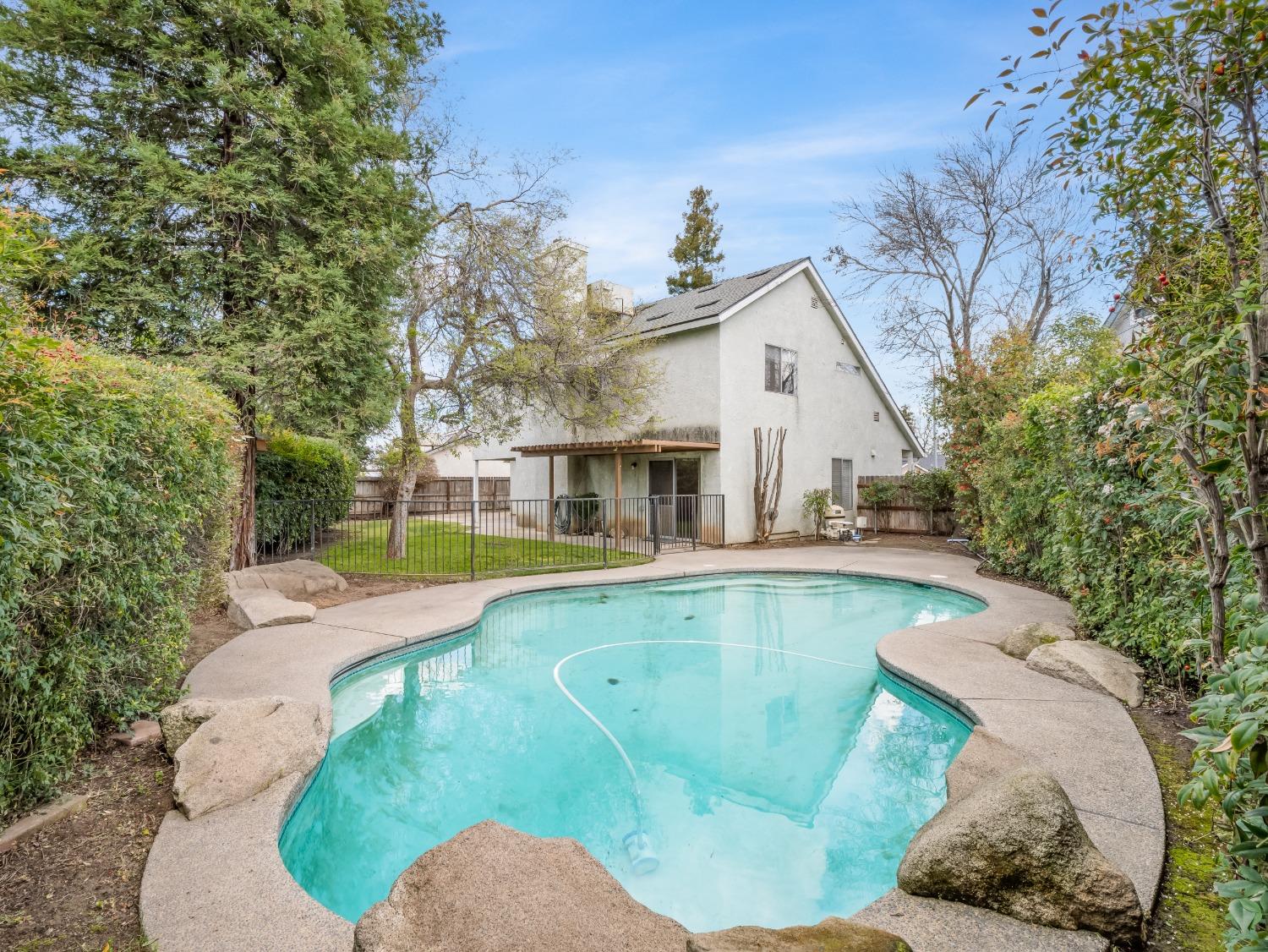 272 North Caesar Avenue Clovis, CA 93612 - Photo 34 of 34 a view of a house with swimming pool and sitting area