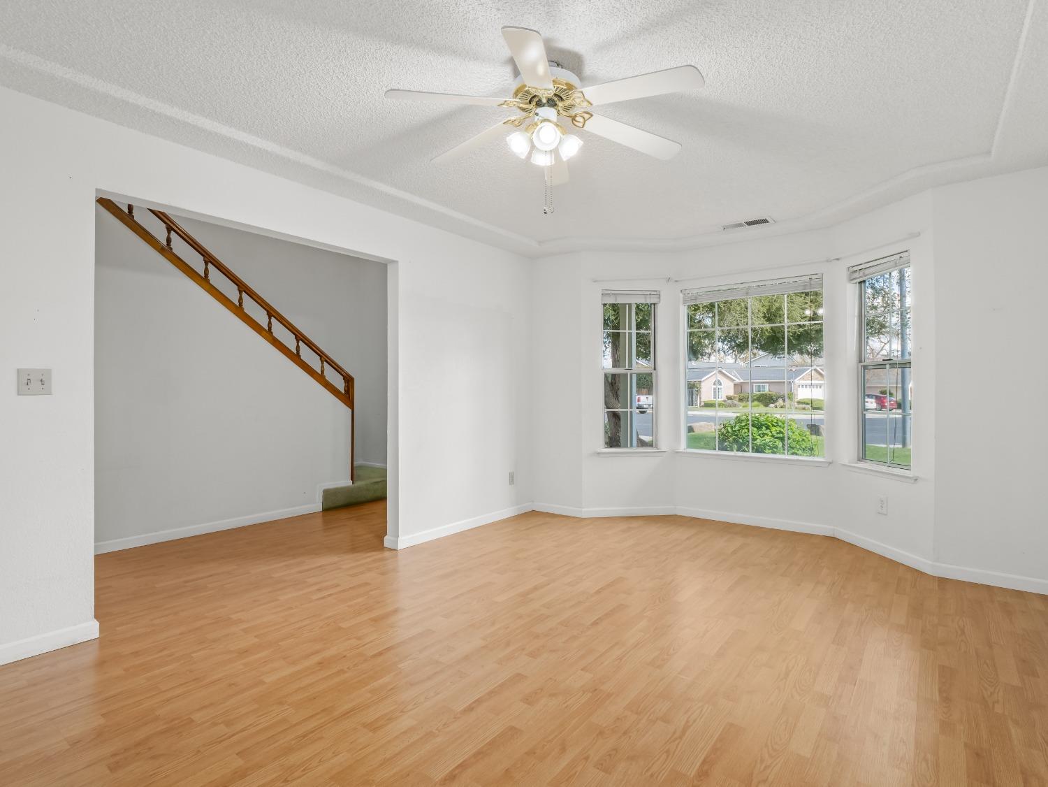 272 North Caesar Avenue Clovis, CA 93612 - Photo 4 of 34 a view of an empty room with a window