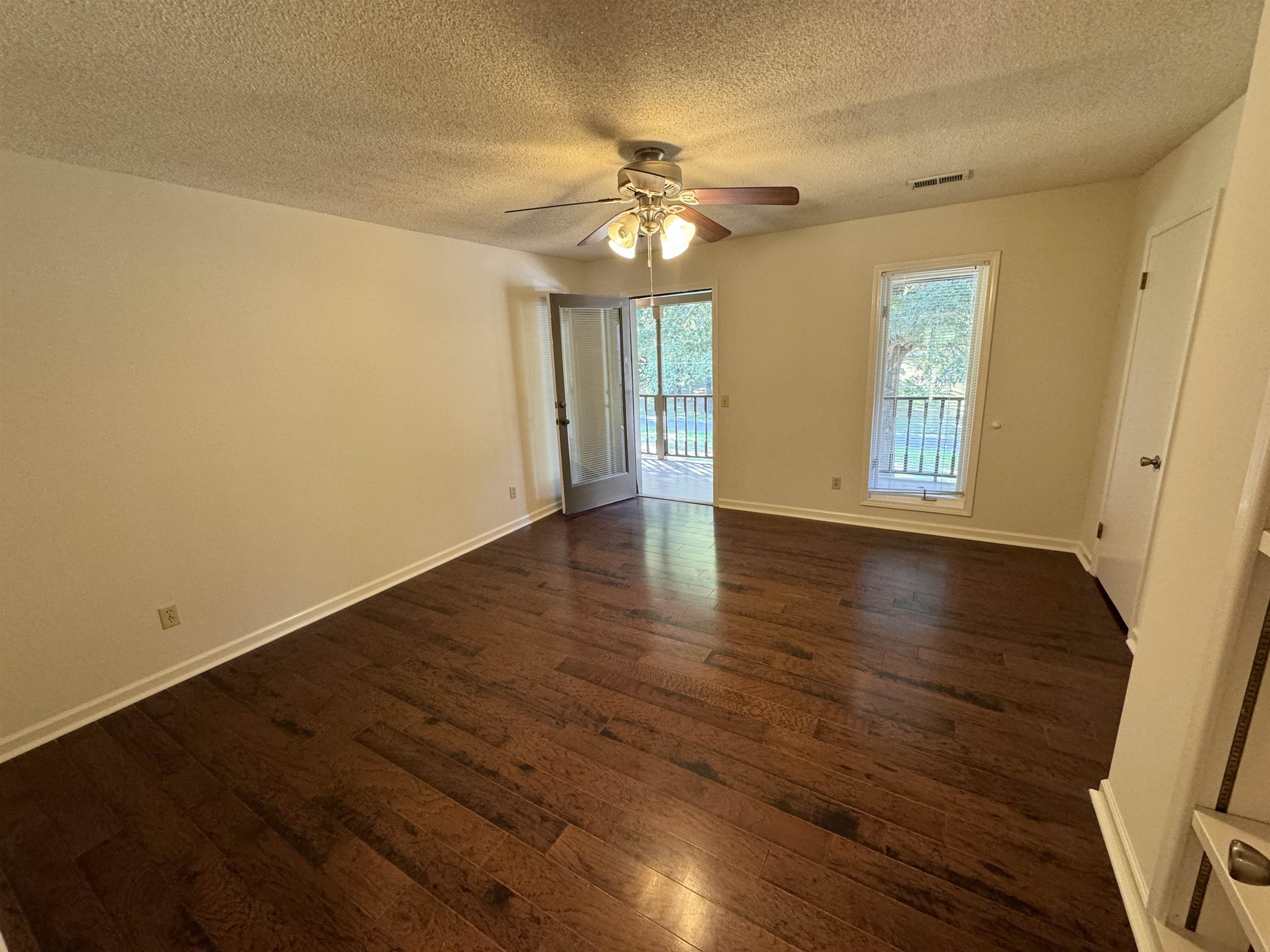 20 Tonya Drive Ripley, TN 38063 - Photo 17 of 33 a view of an empty room with wooden floor and a window