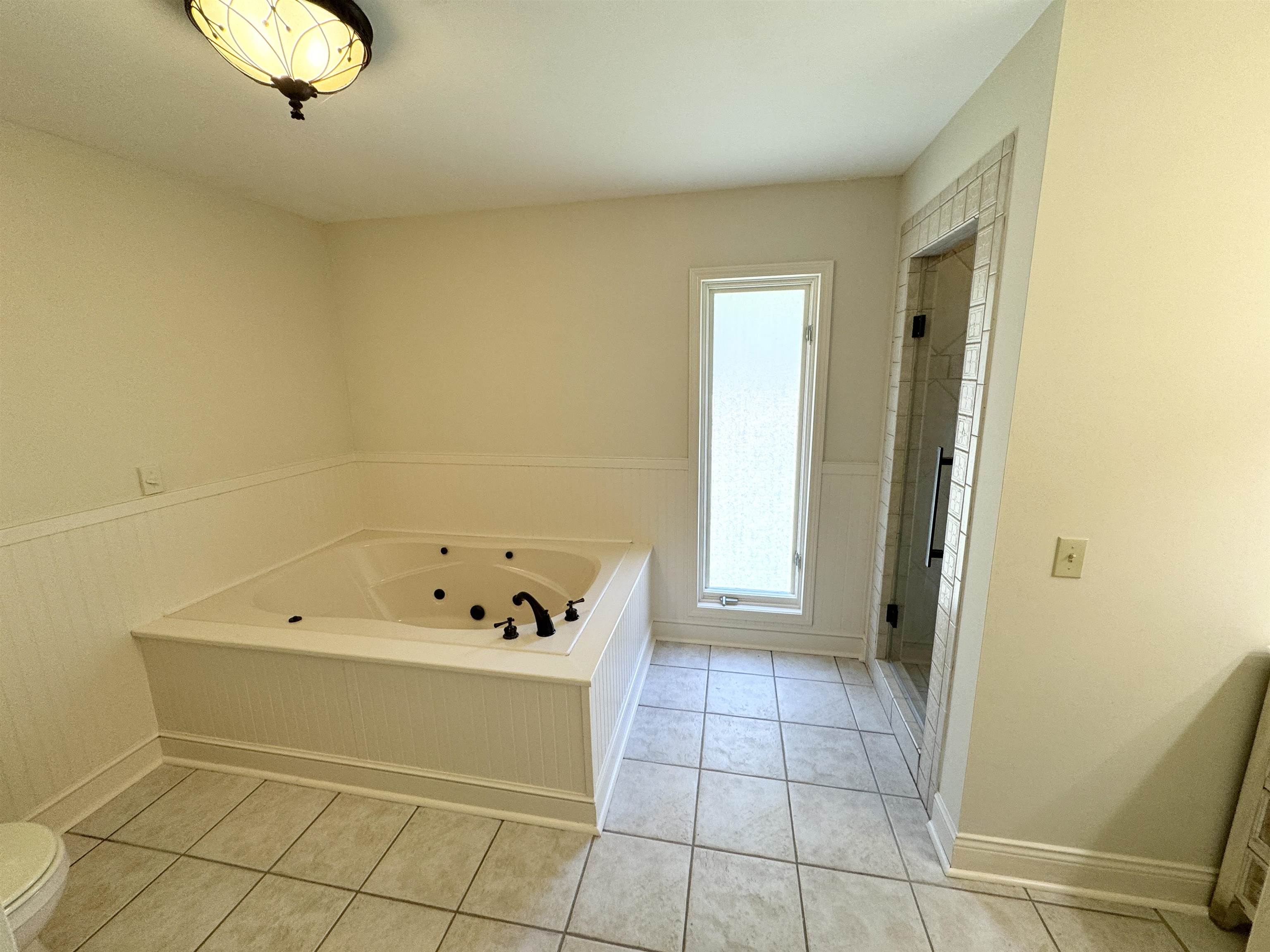 20 Tonya Drive Ripley, TN 38063 - Photo 20 of 33 a bathroom with a bathtub and shower