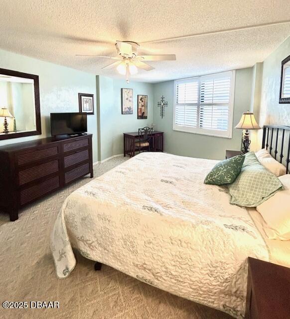 1415 Ocean Shore Drive, Unit 1011 Ormond Beach, FL 32176 - Photo 12 of 20 a large bedroom with a bed and a dresser