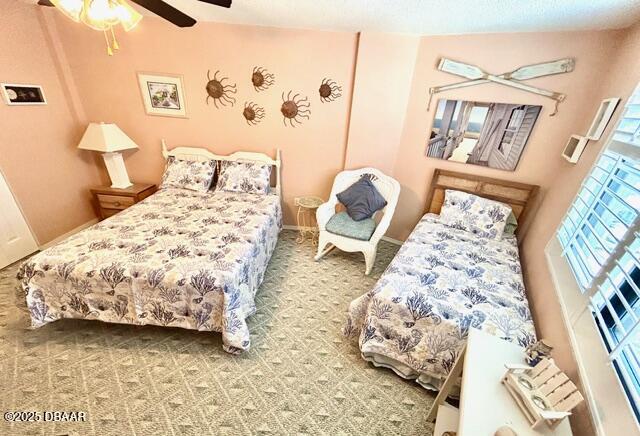 1415 Ocean Shore Drive, Unit 1011 Ormond Beach, FL 32176 - Photo 15 of 20 a bedroom with a bed and wooden floor