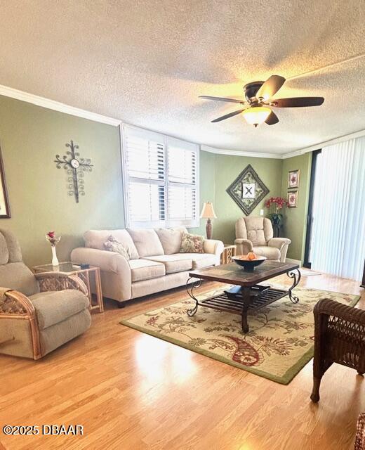 1415 Ocean Shore Drive, Unit 1011 Ormond Beach, FL 32176 - Photo 8 of 20 a living room with furniture ceiling fan and a window