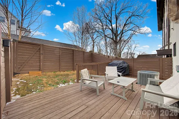 a view of a patio with wooden floor