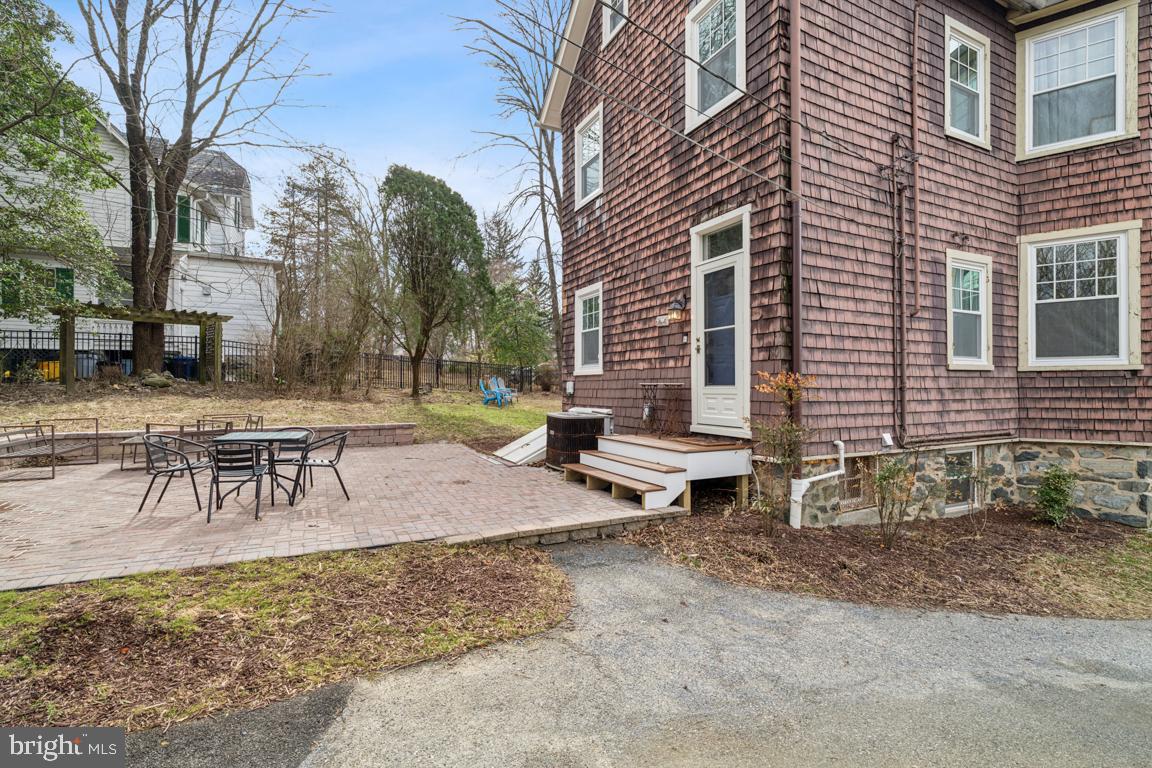 1811 Dixon Road Baltimore, MD 21209 - Photo 36 of 45 a view of a house with backyard and sitting area