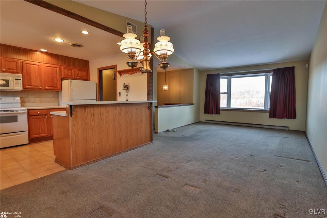 2629 Beacon Road Bath, PA 18014 - Photo 11 of 40 a view of a kitchen with a sink and chandelier