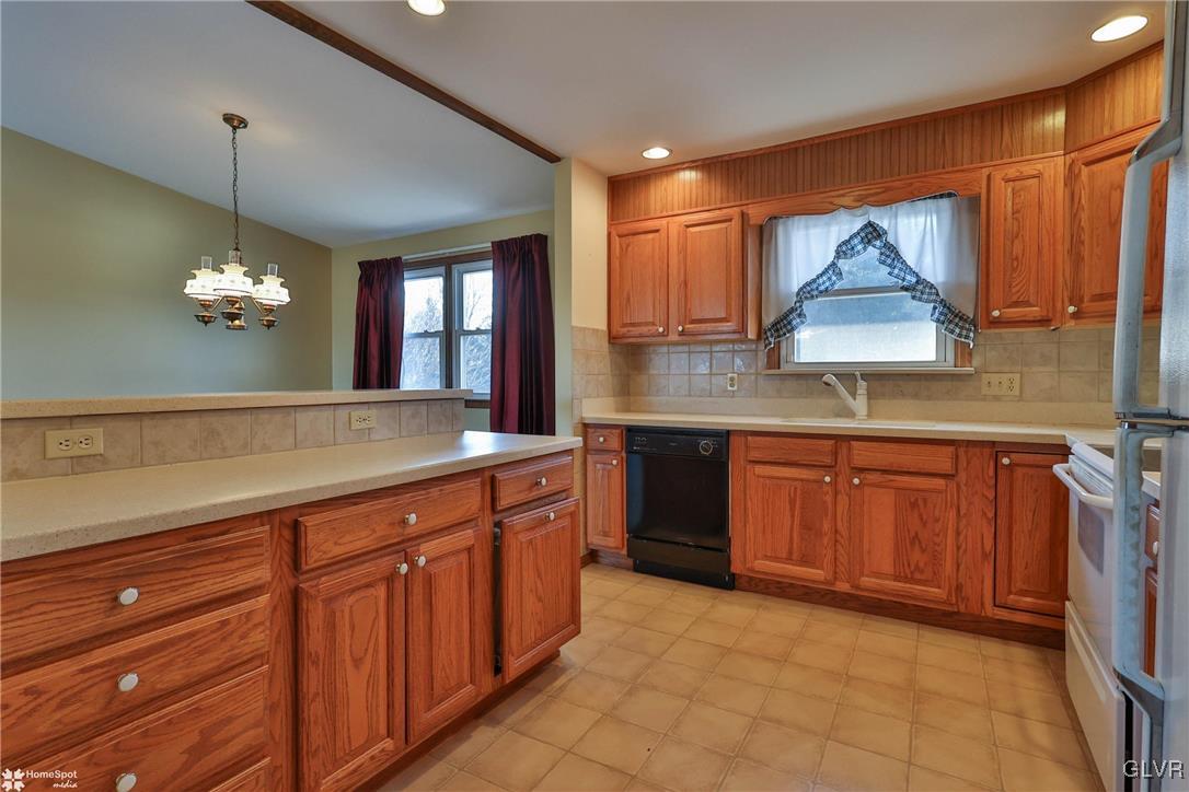 2629 Beacon Road Bath, PA 18014 - Photo 14 of 40 a spacious bathroom with a granite countertop sink a mirror and a vanity